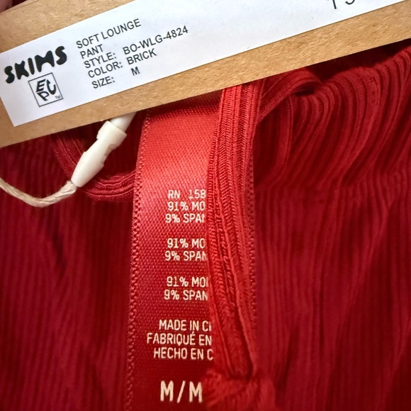 NWT SKIMS Soft Lounge Pants in size Medium and XS in Brick Red - Picture 3 of 5